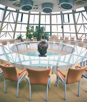 Workplace Conference hall with round table and chairs